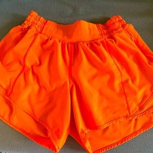 Lululemon Highlight orange shorts side 4 low rise 4’ RARE